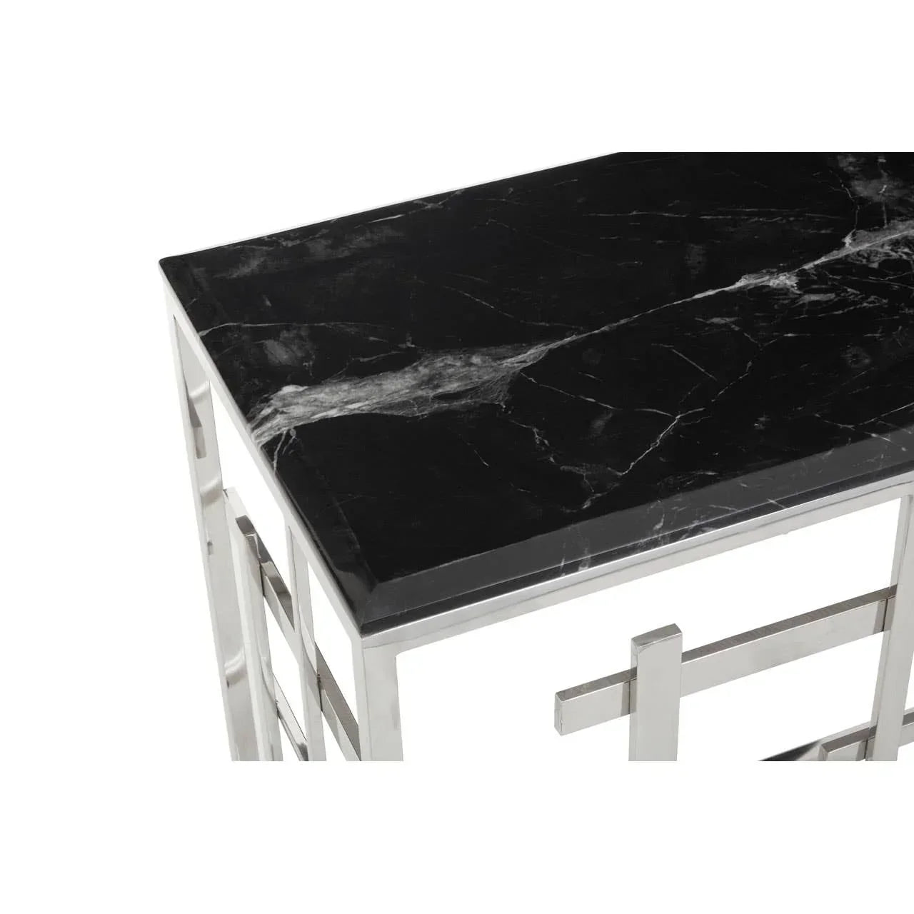 Rectangular black marble top table with chrome metal frame, close-up view