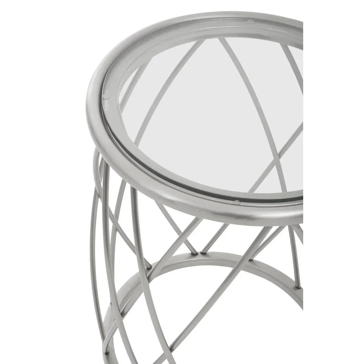 Round glass top side table with silver metal lattice base, close-up view