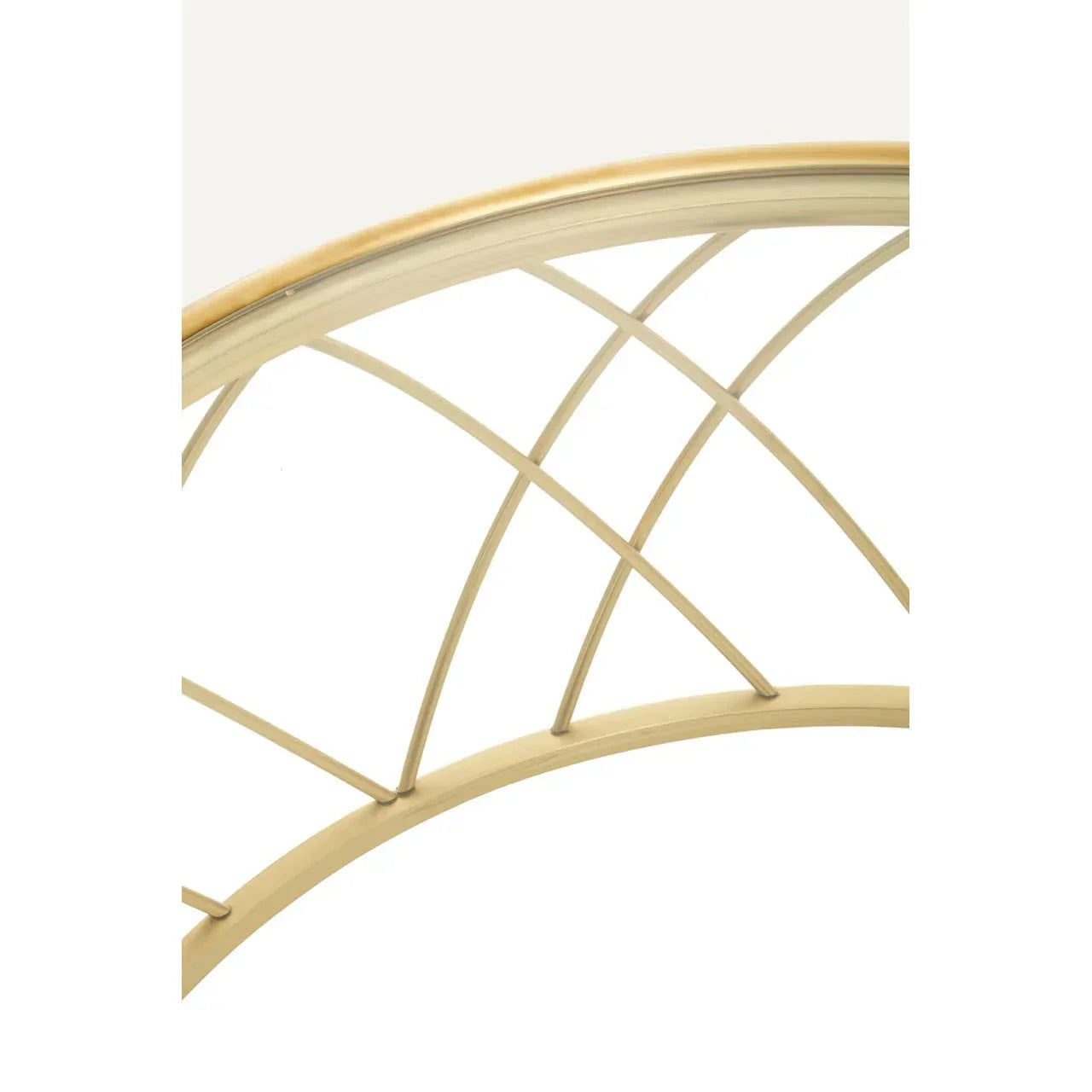 Gold metal bed frame headboard with curved lattice design, close-up view
