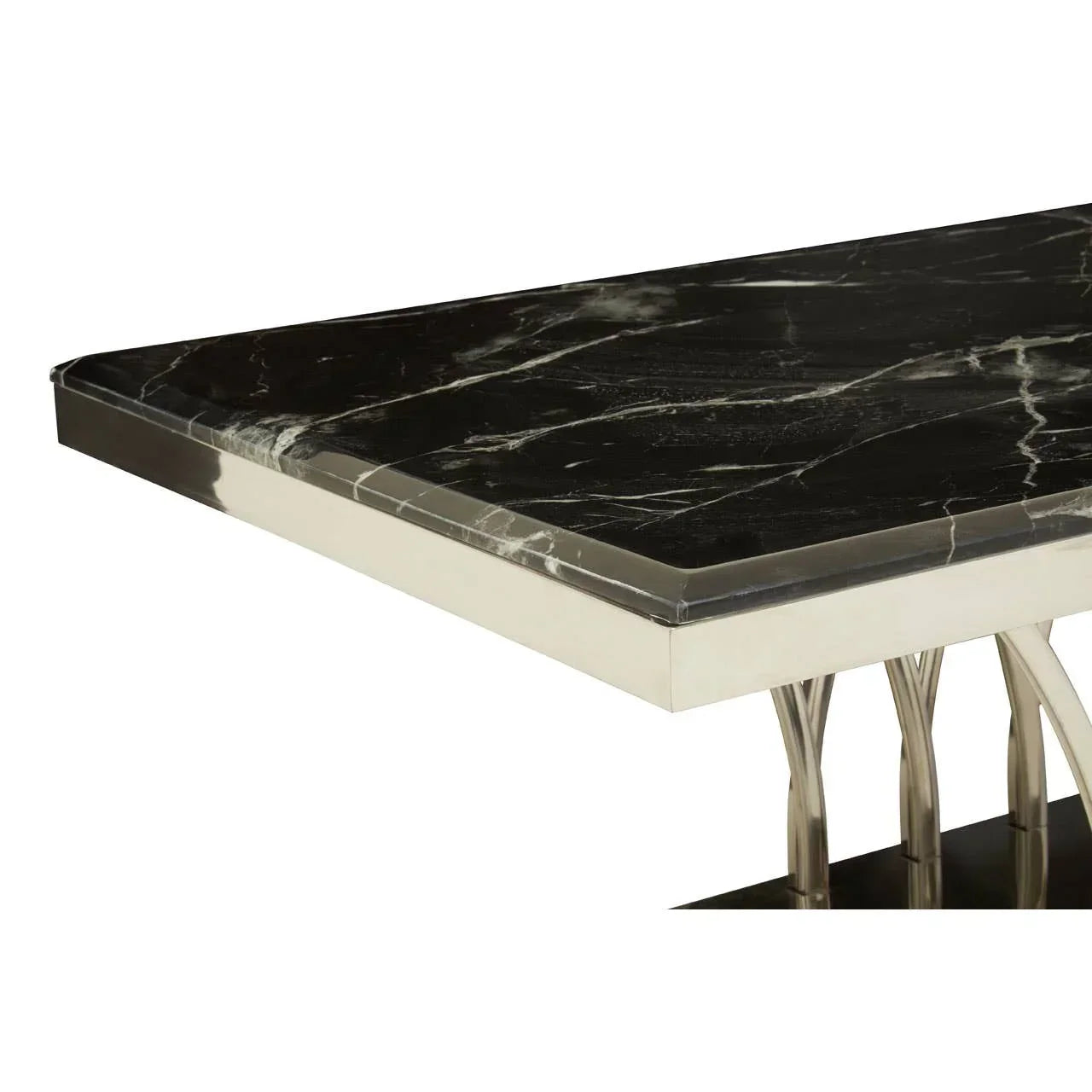 Black marble dining table with chrome frame and sleek corner detail