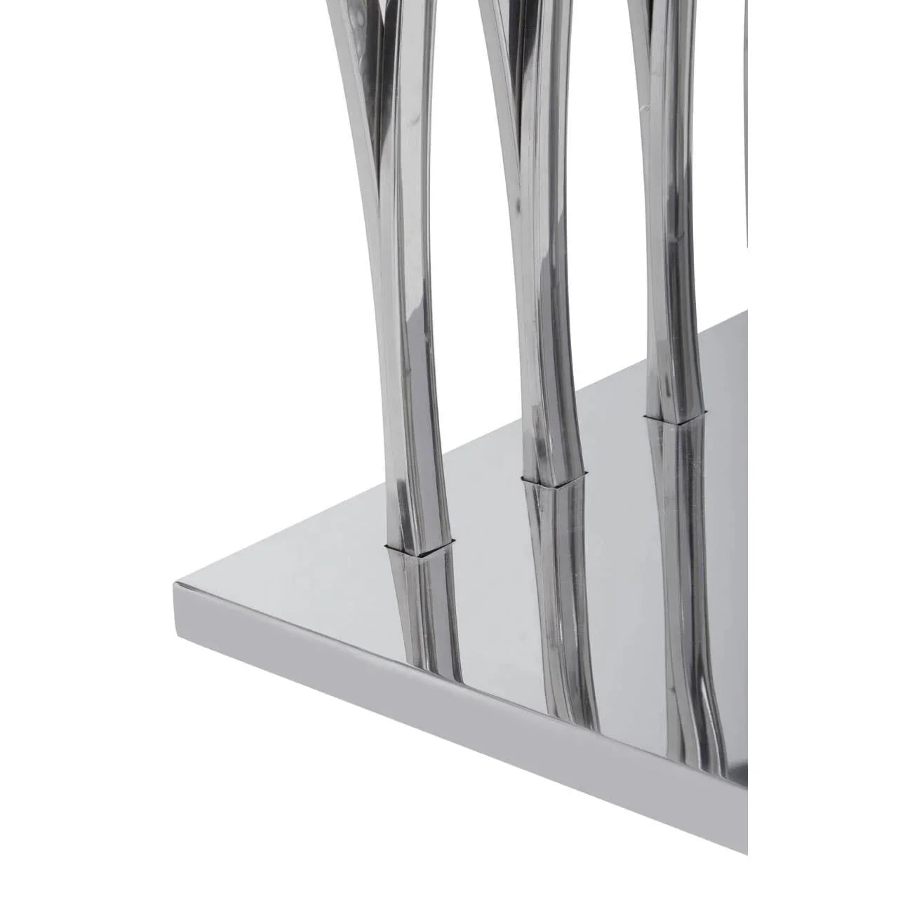 Chrome dining table base with reflective finish and modern curved metal legs