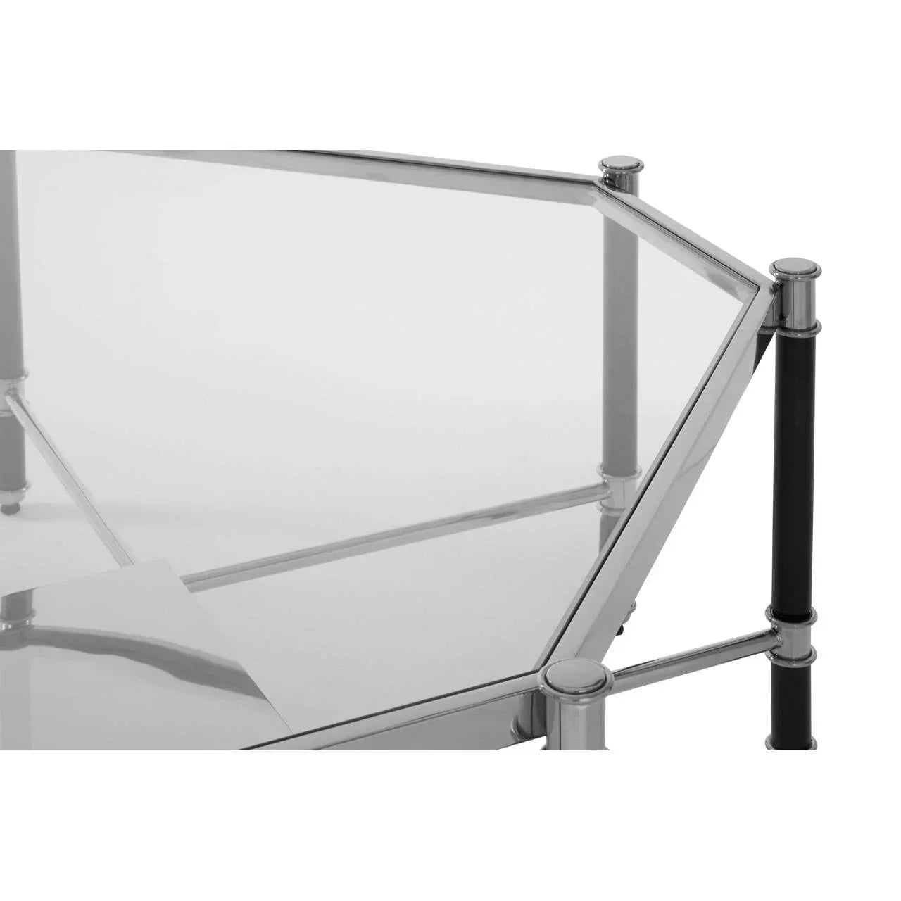 Glass coffee table with chrome frame, geometric design and black accent legs, close view