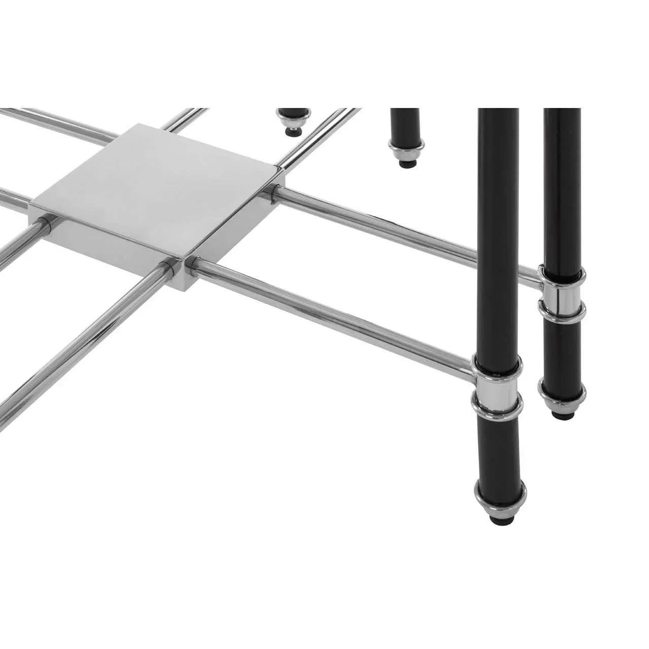 Chrome and black metal table legs with crossbar frame detail