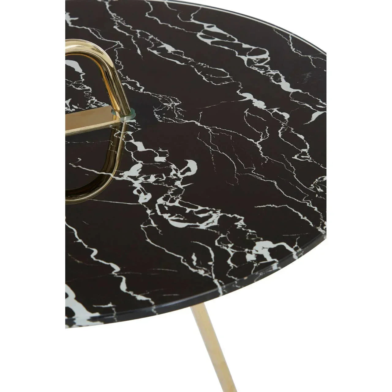 Round black marble side table with gold metal handle and legs, close-up of tabletop