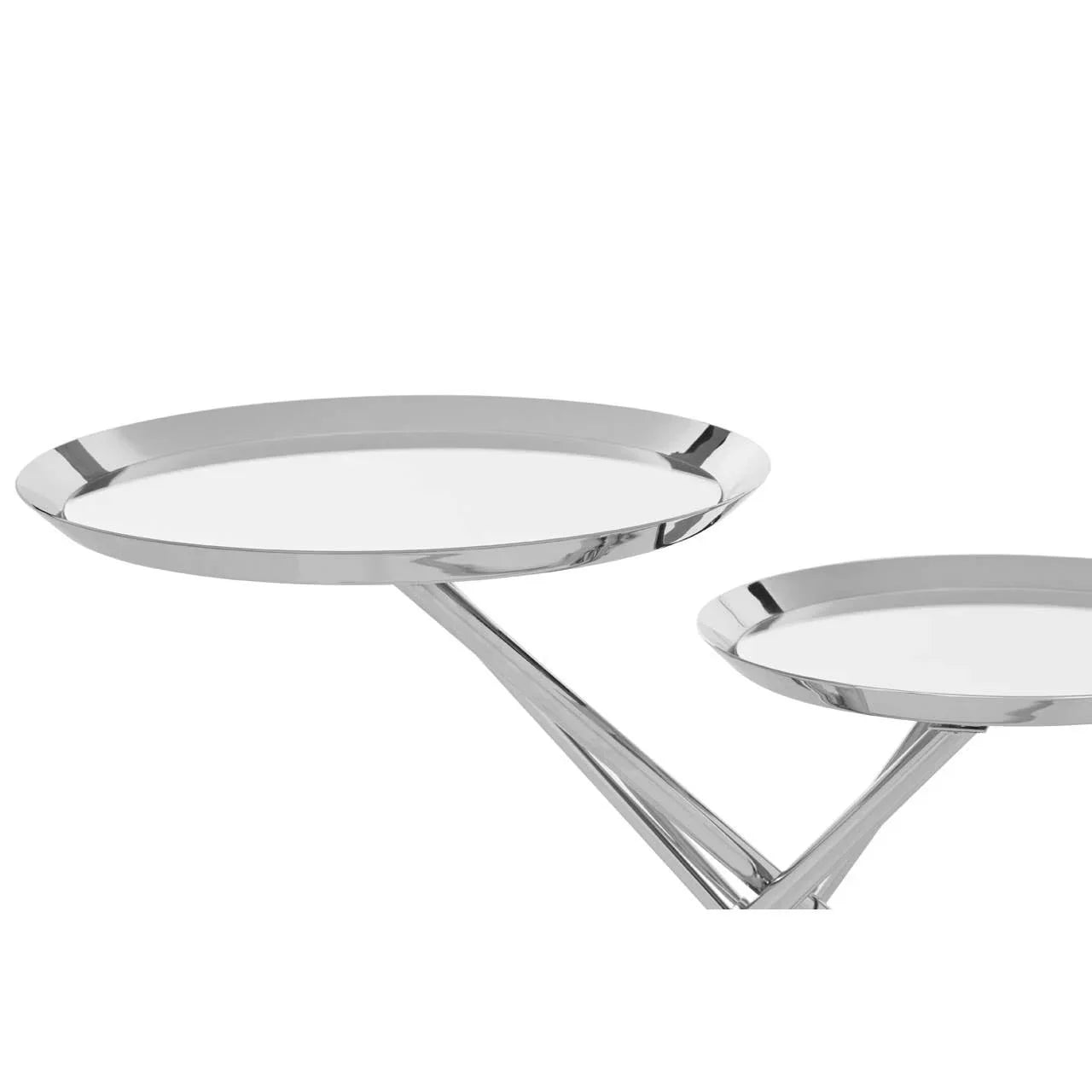 Chrome metal nesting tables with round trays and modern angled legs, close-up view
