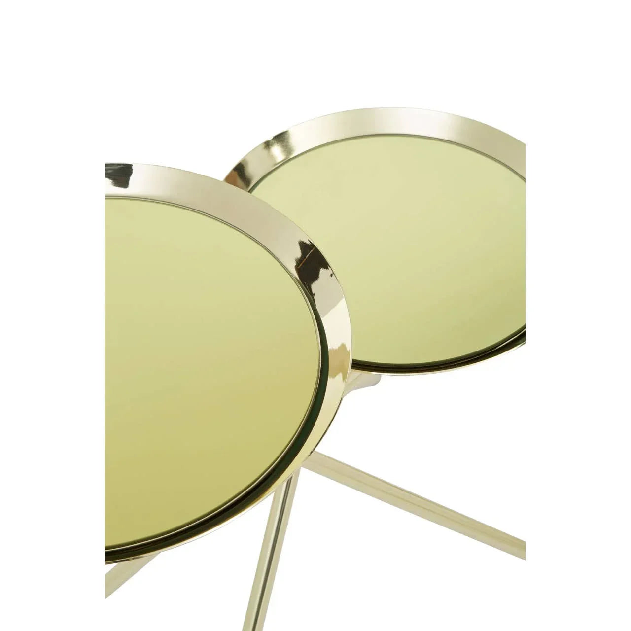 Gold metal nesting side tables with mirrored tops, close-up of round tabletops