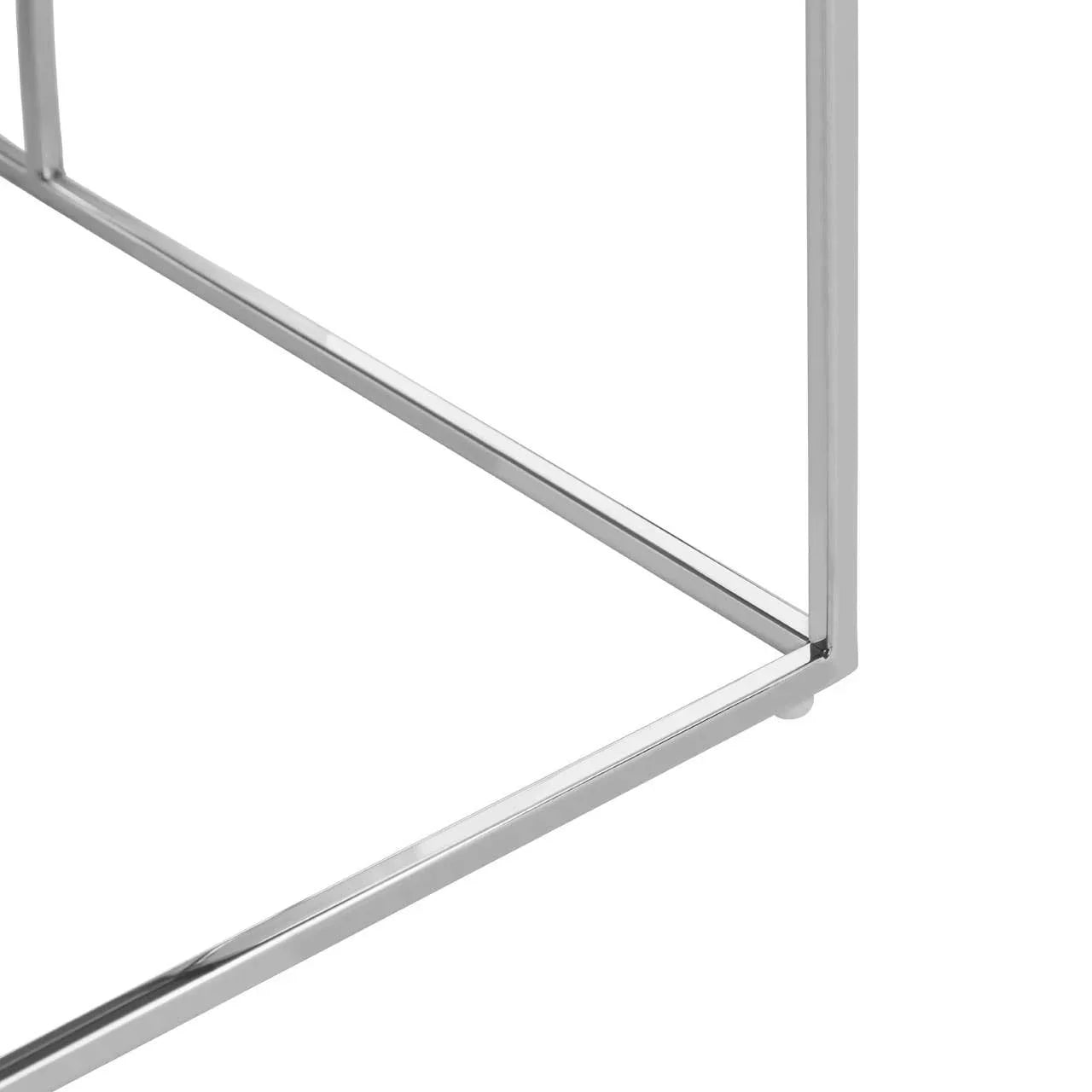 Polished chrome table legs with square metal frame, close-up corner view