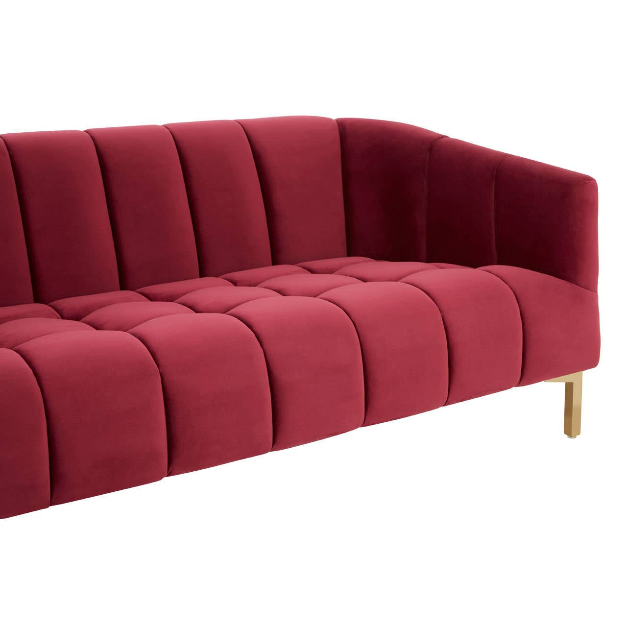 A plush, three-seat sofa upholstered in rich wine-colored velvet, featuring vertical channel tufting on the backrest and seat cushions. The sofa has sleek, angled armrests and stands on elegant, tapered wooden legs