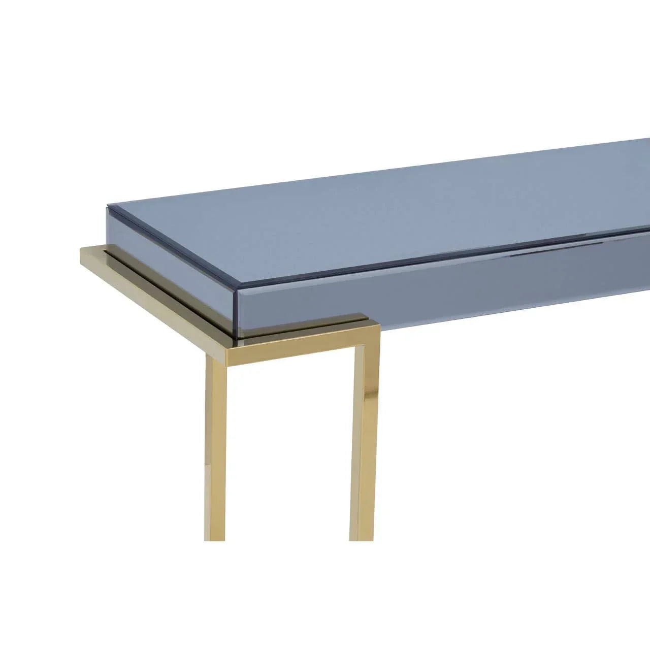 Mirrored console table with gold metal legs and blue glass top, corner angle view