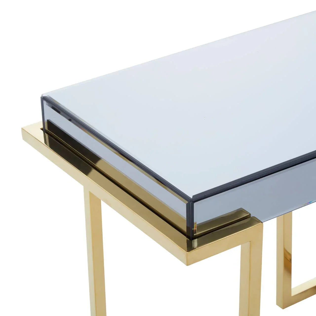 Glass top side table with gold metal legs and modern geometric design