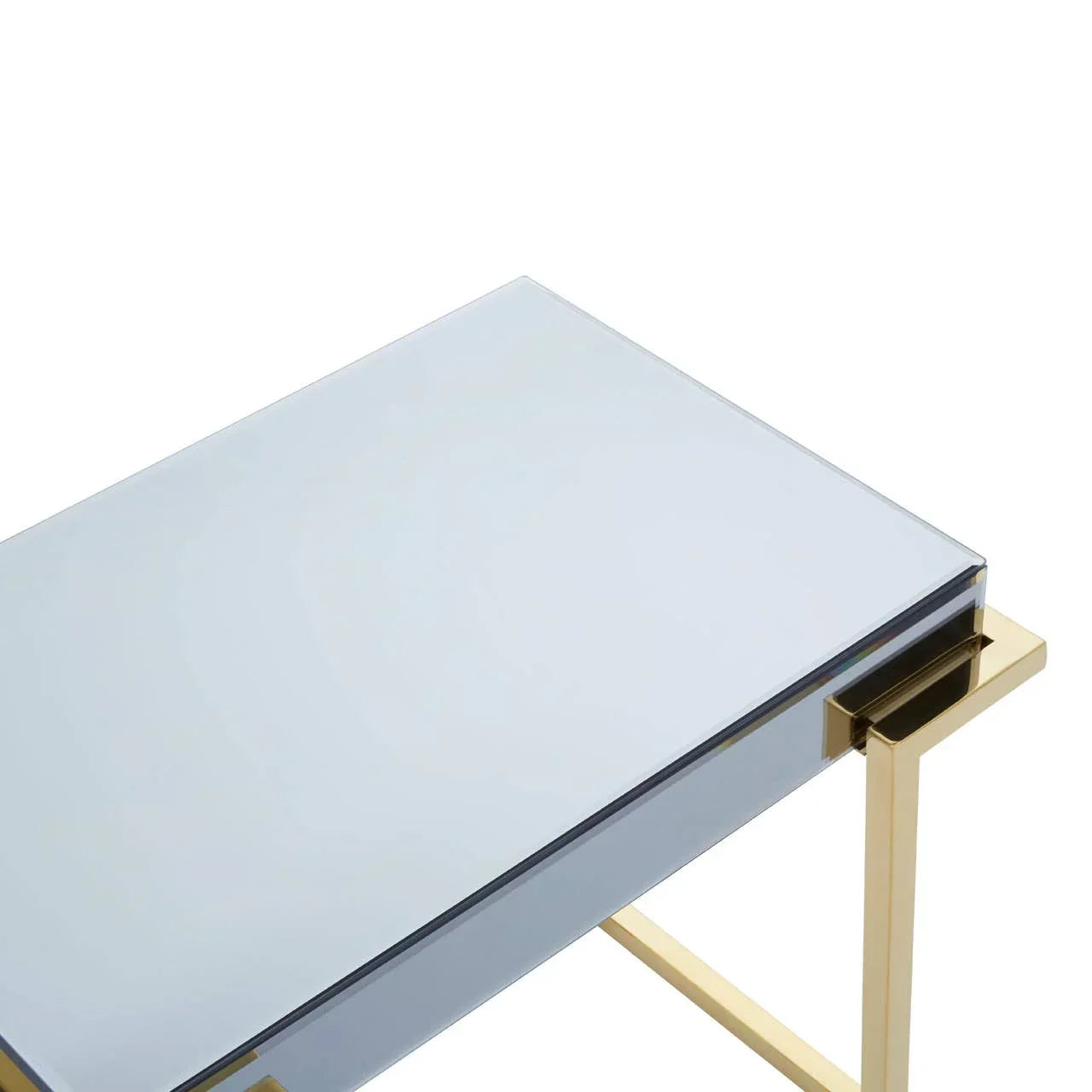 Glass top side table with gold metal frame, detailed corner view