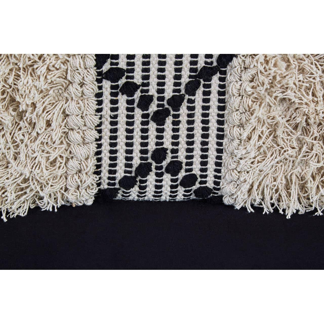 Textured cream and black cushion with woven geometric pattern and shaggy fringed edge