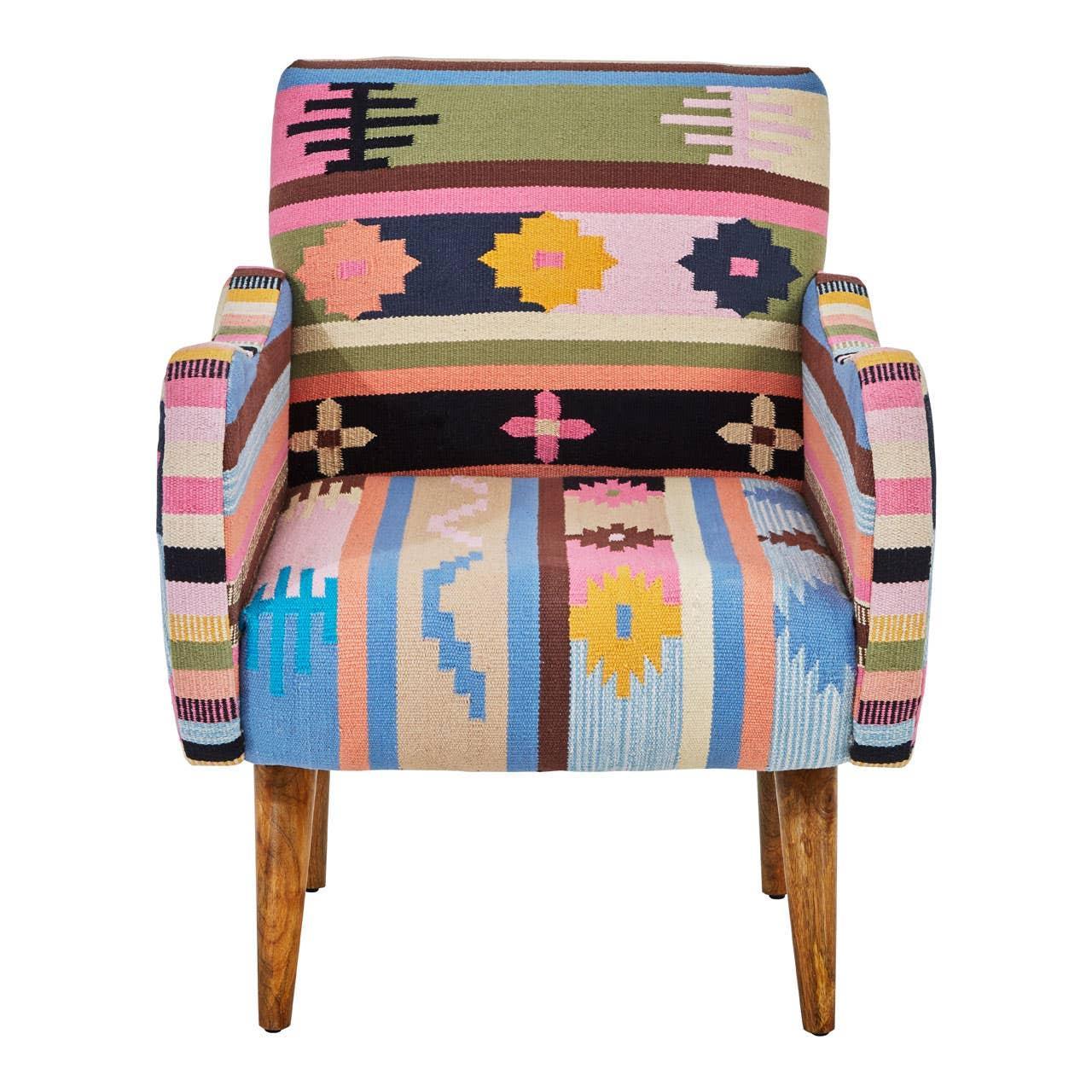 Patterned accent chair with wooden legs, multicolour geometric upholstery, front view