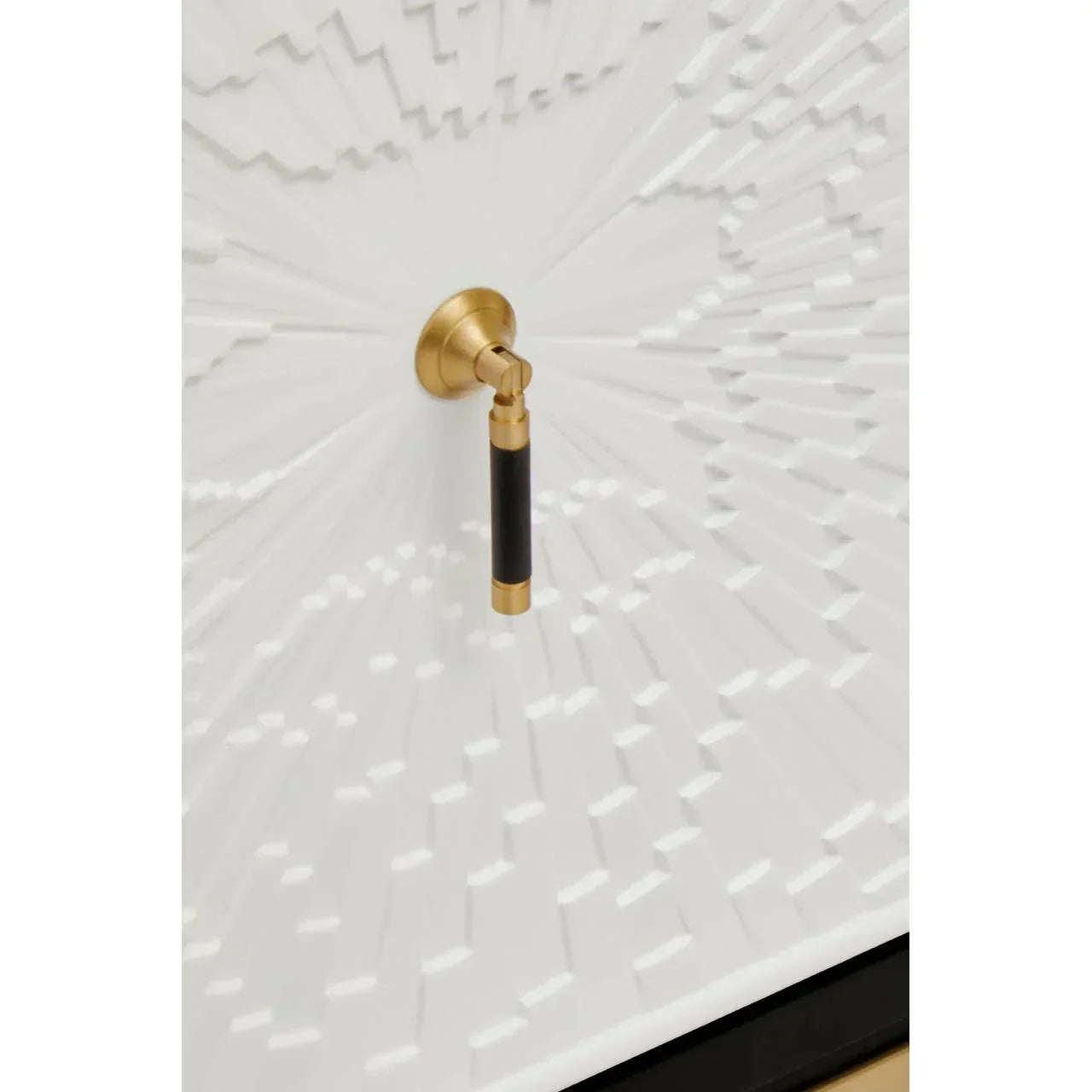 Textured white cabinet door with gold and black handle detail