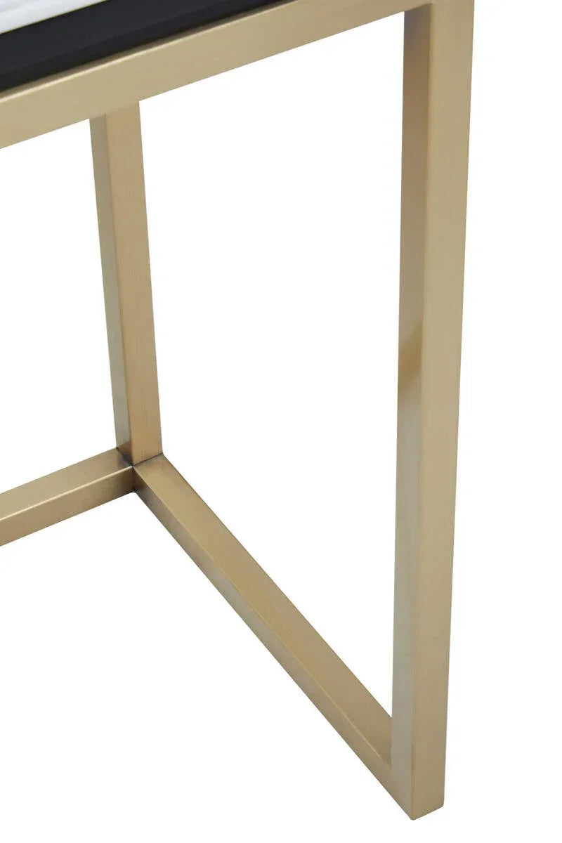 Gold metal table leg frame with marble effect tabletop corner detail