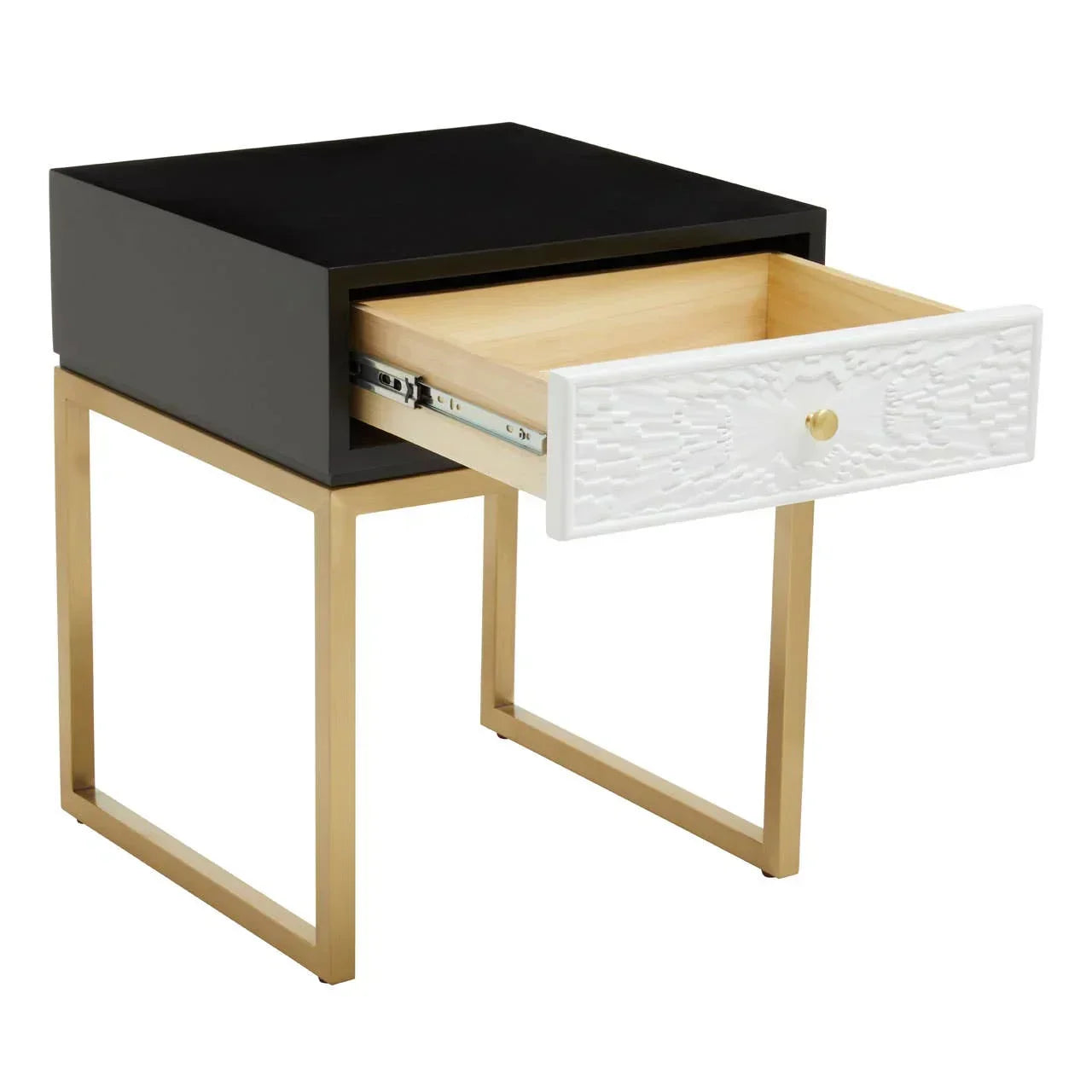 Modern bedside table with black top, gold metal legs, and open white textured drawer