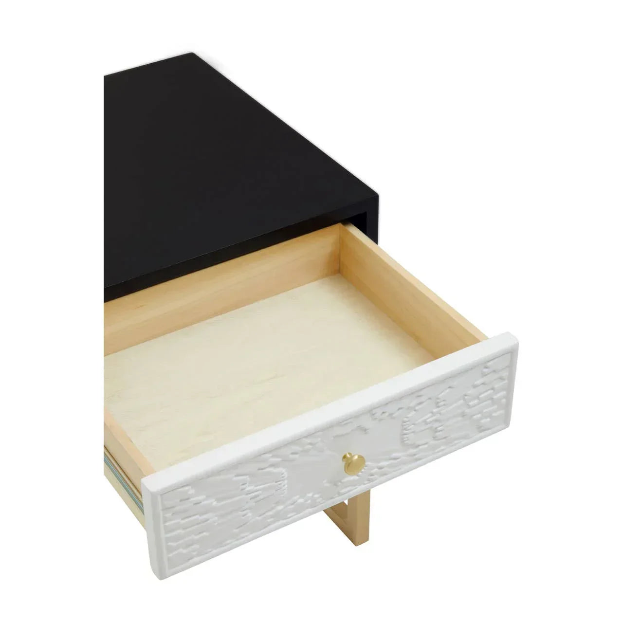 Black bedside table with open white textured drawer and gold handle