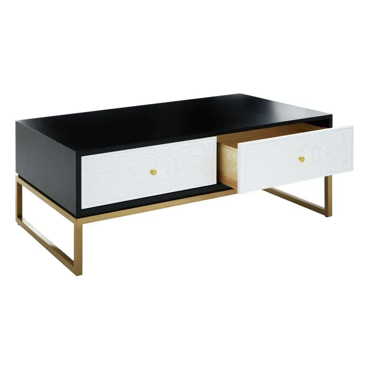 Modern coffee table with black top, gold metal base, and two white drawers, one open