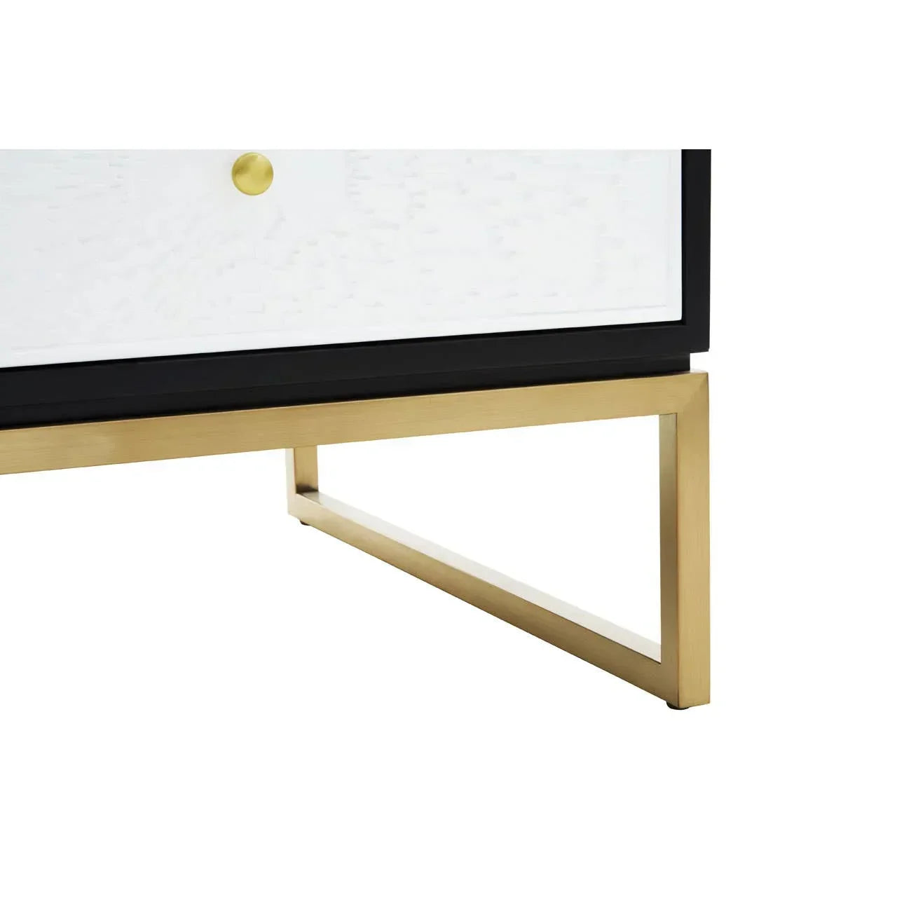 Gold metal leg and white drawer detail on modern sideboard