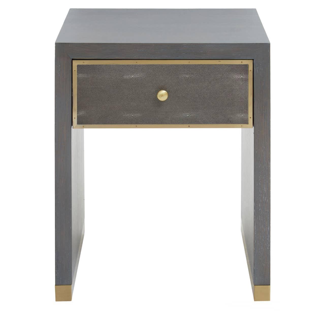 Modern bedside table with grey wood finish, single drawer and brass knob detail