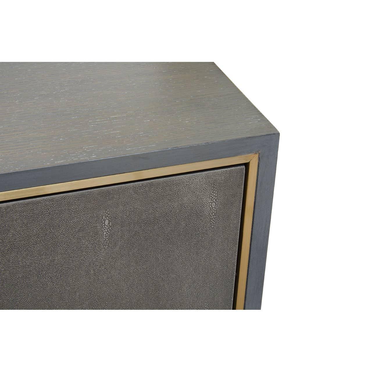 Grey sideboard corner with textured panel and gold trim detail