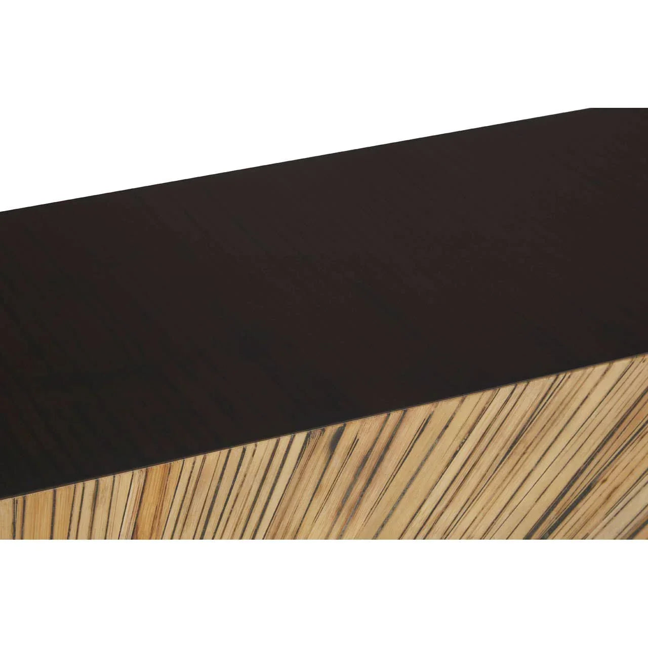 Close up of wooden table corner with dark tabletop and striped wood grain base