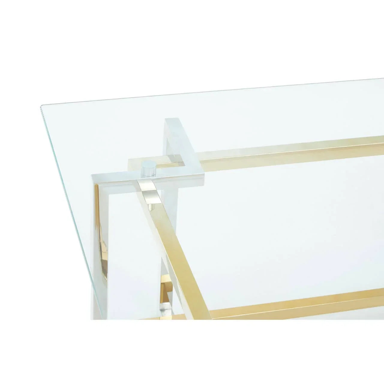 Glass coffee table with gold metal frame and modern geometric base, close-up corner view