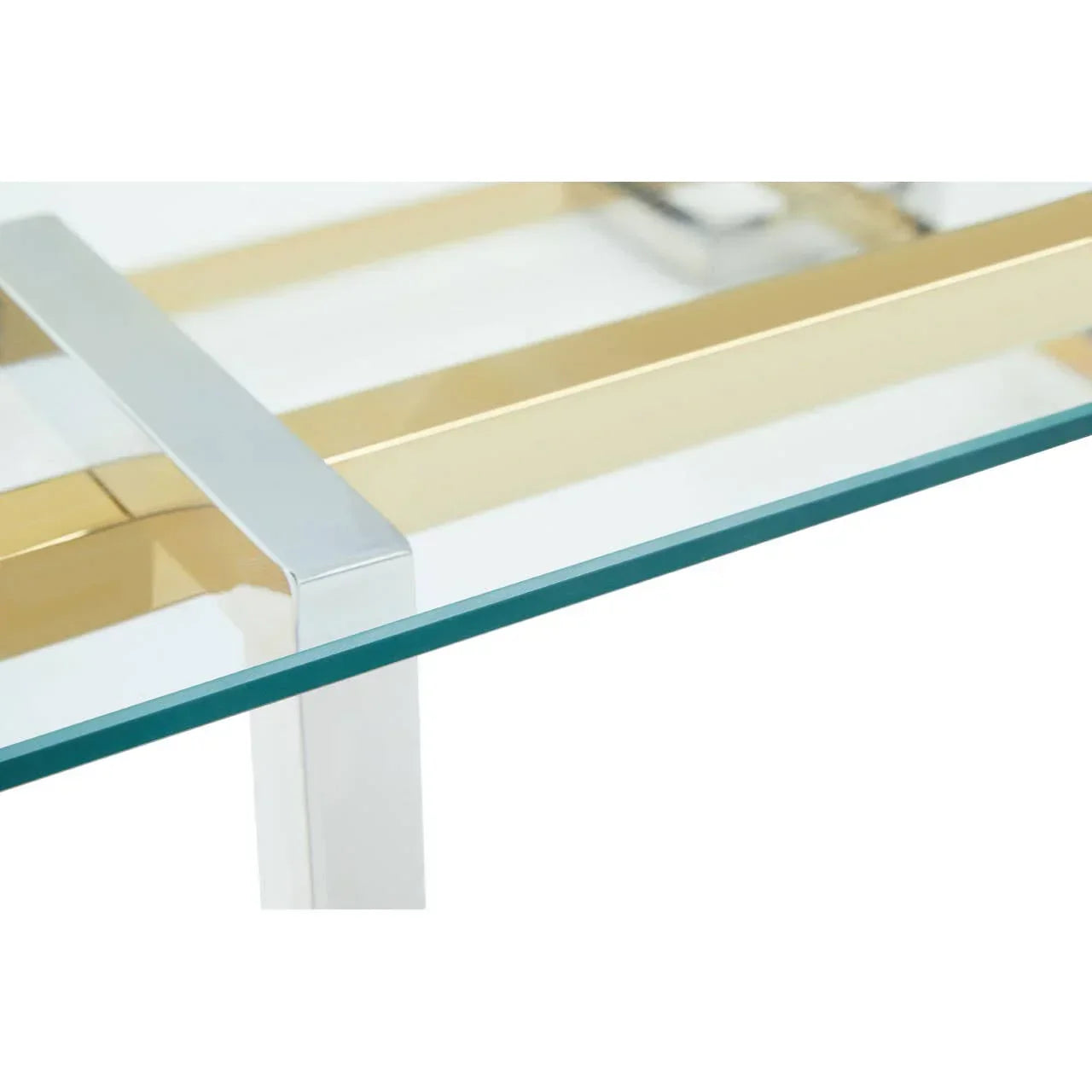 Glass coffee table corner with chrome and gold metal frame detail