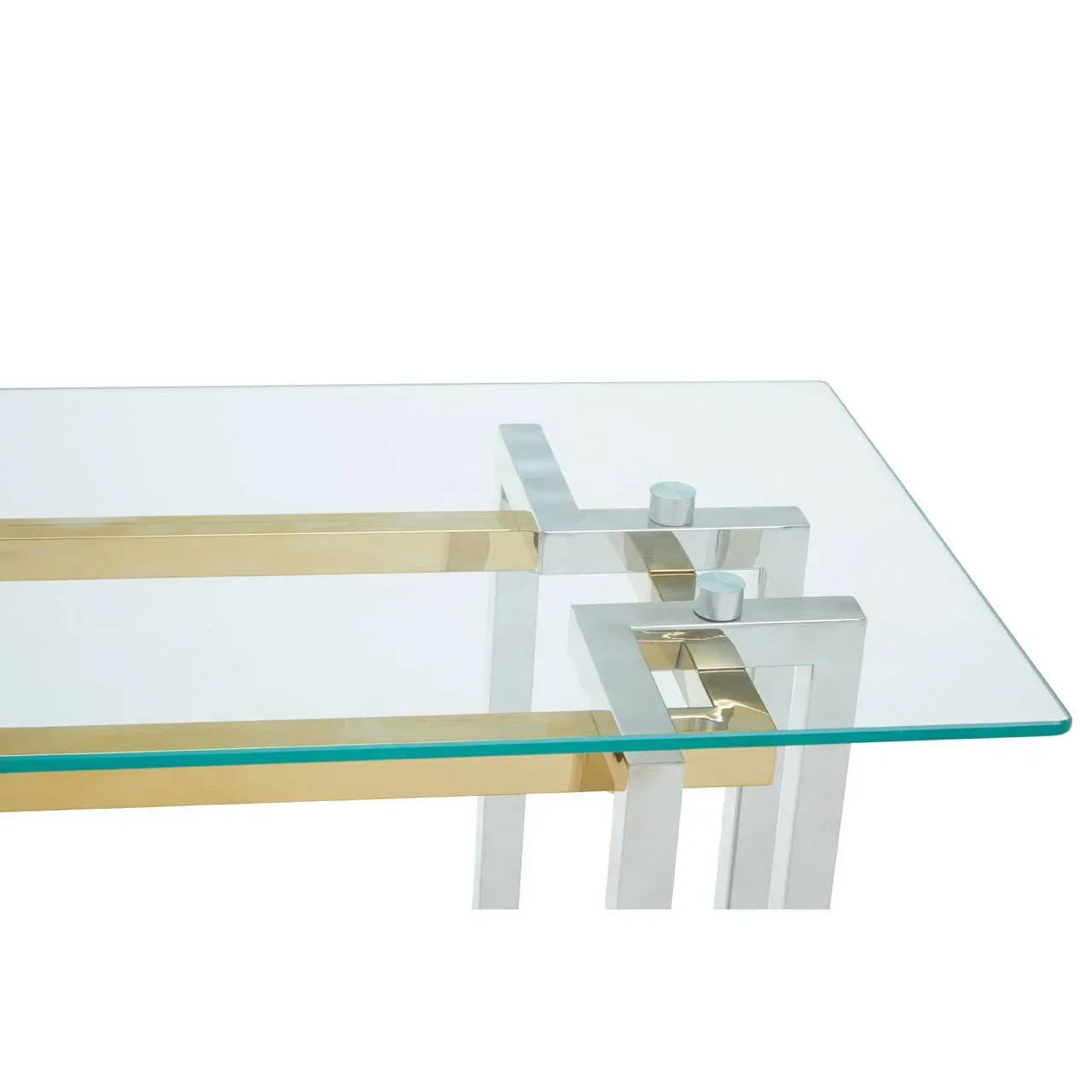 Glass coffee table with gold and chrome metal frame, modern corner detail visible