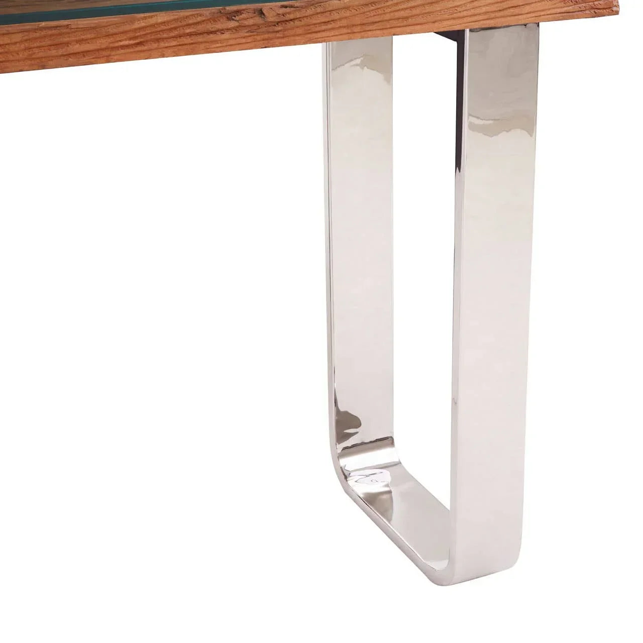 Dining table with polished chrome U-shaped metal leg and wood top close view
