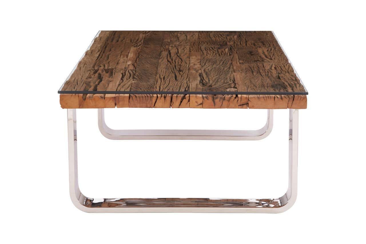 Rectangular coffee table with wooden top, glass surface and chrome metal legs, front view