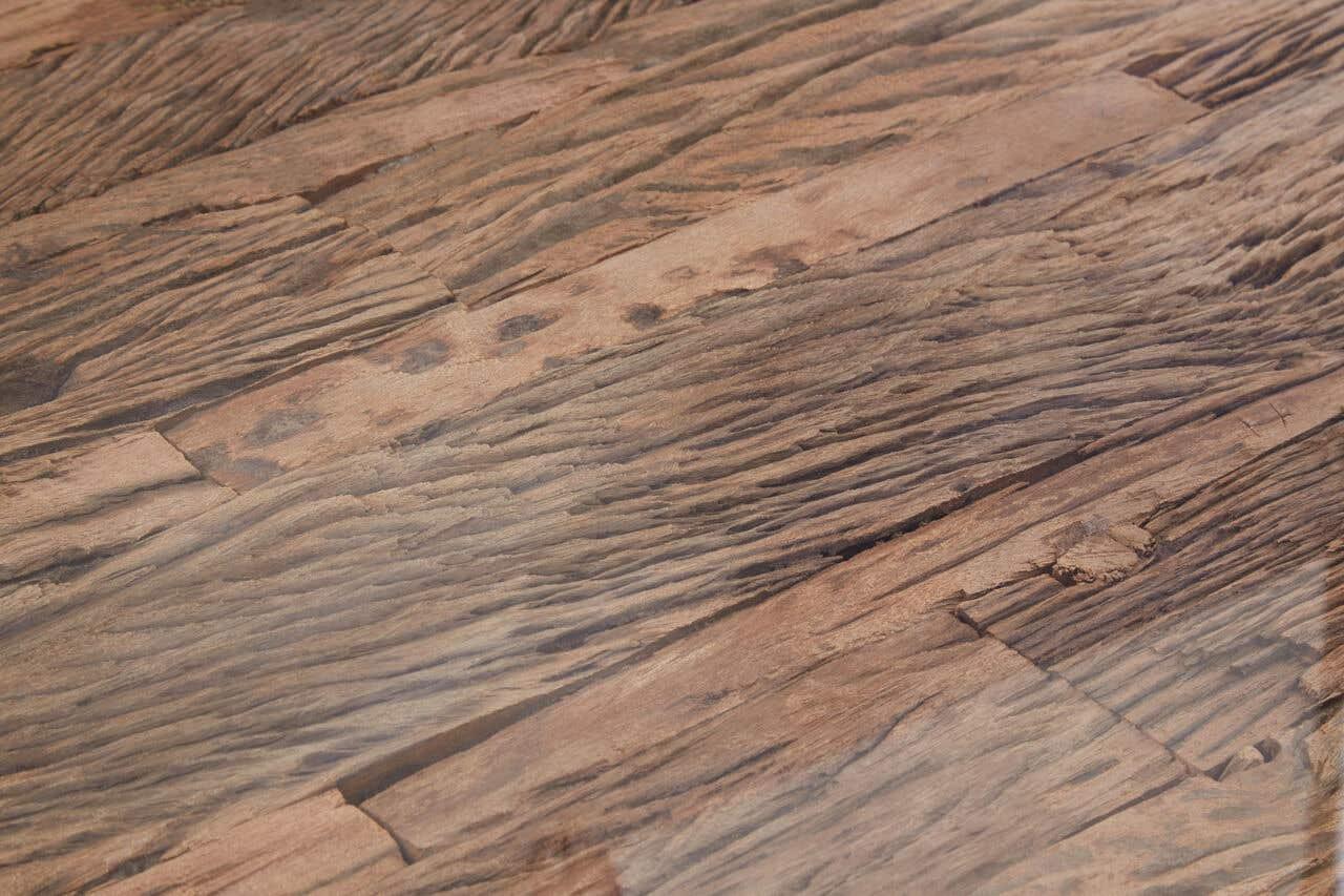 Close up of rustic wooden table top with textured natural grain detail
