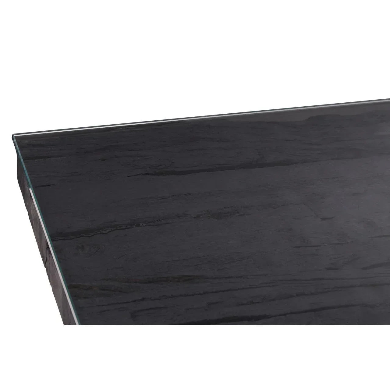 Closeup of black dining table with glass top and wood texture