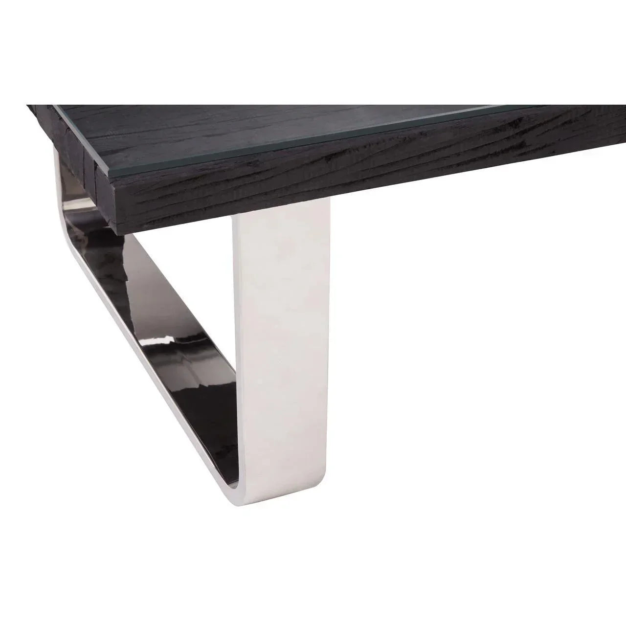 Close up of modern coffee table with black wooden top and chrome metal leg