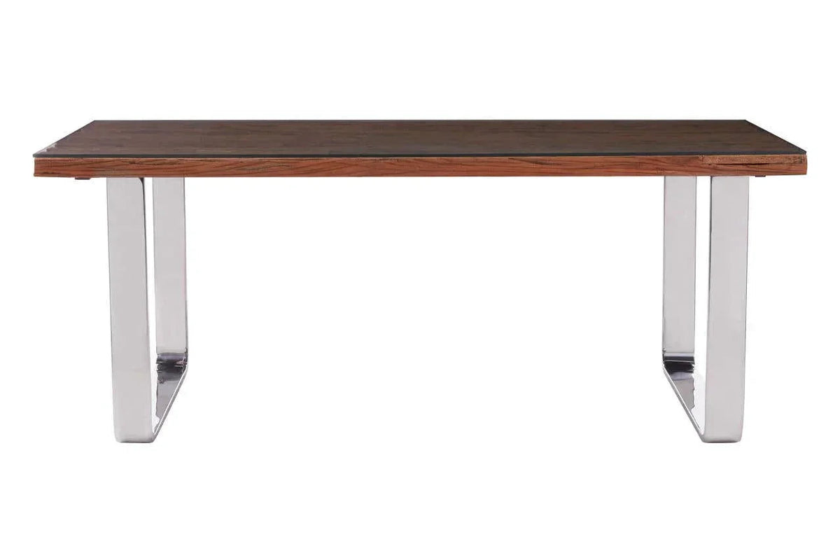 Two-tone wood dining table top on chrome sled-style legs, front view