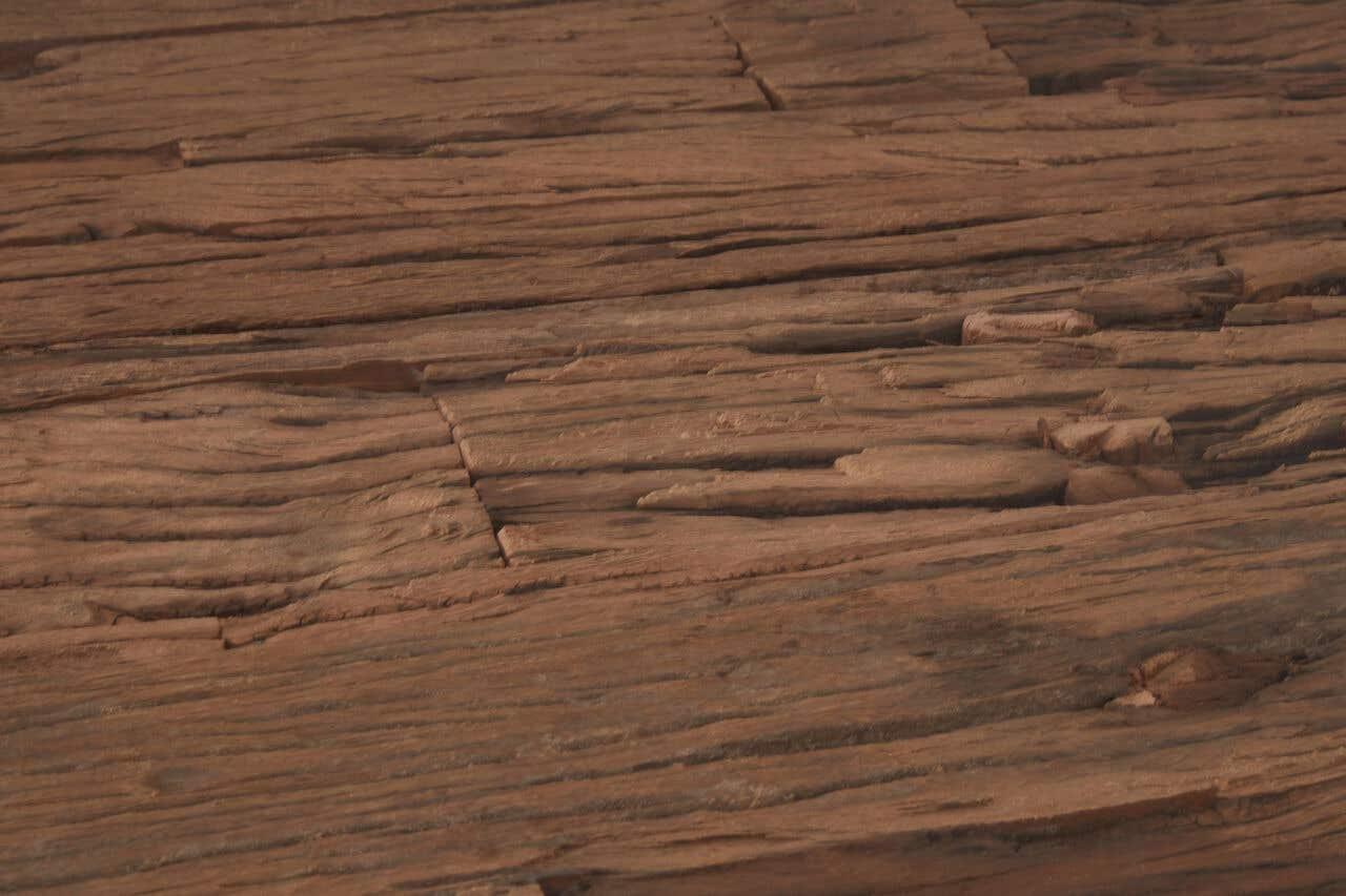 Close-up of rustic wooden flooring with natural grain texture