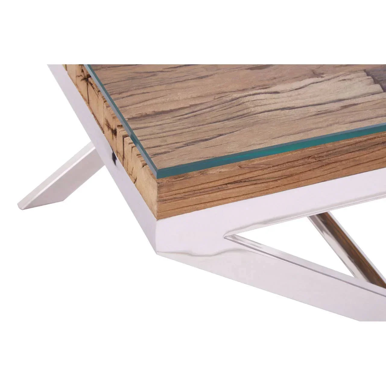 Corner of modern coffee table with glass top, wood detail and chrome metal frame