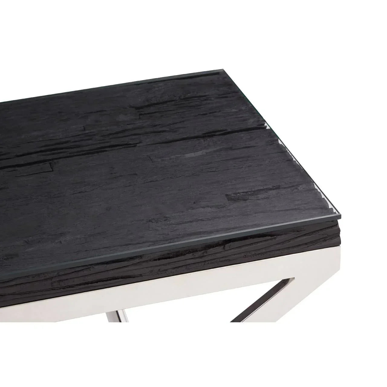 Close-up of black textured coffee table with glass top and chrome metal frame