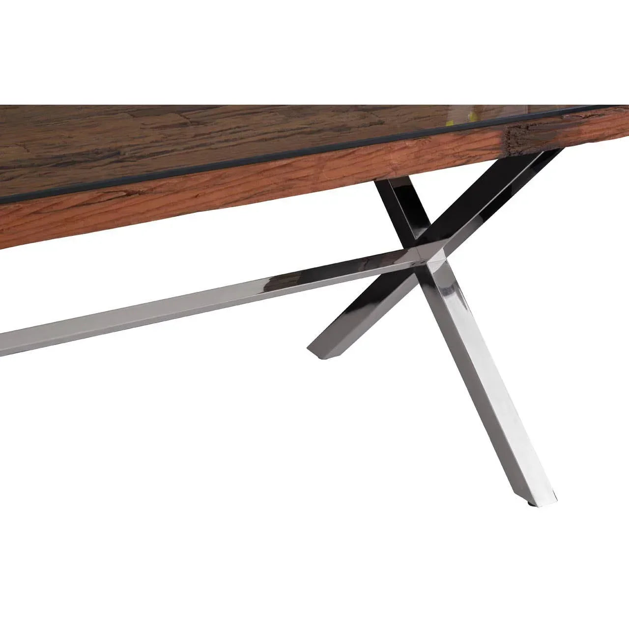 Dining table corner with wooden top and chrome metal legs in cross design
