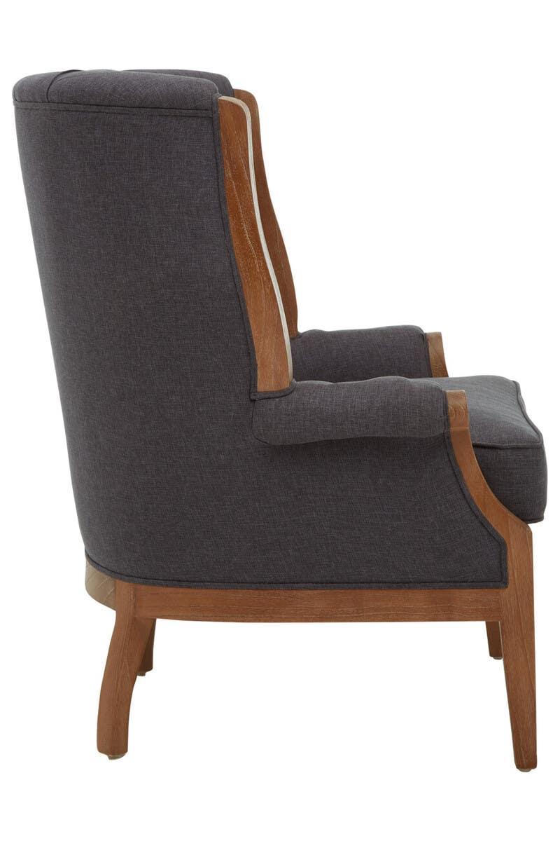 Side view grey fabric armchair with wooden legs and frame