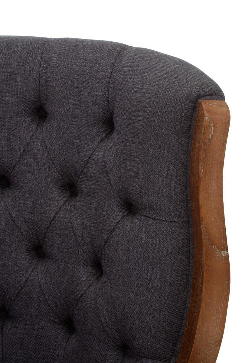 Tufted dark grey sofa back with wooden frame detail