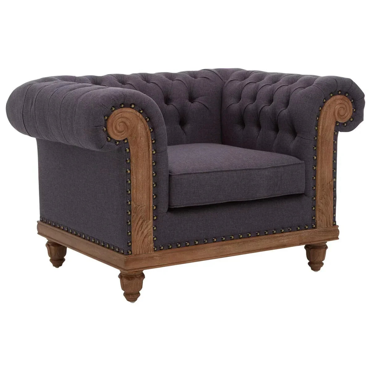 Charcoal grey chesterfield armchair with deep button tufting and wooden carved frame