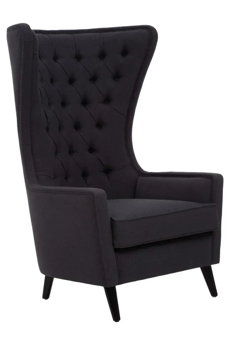 Black velvet high back armchair with button-tufted upholstery and angled wooden legs