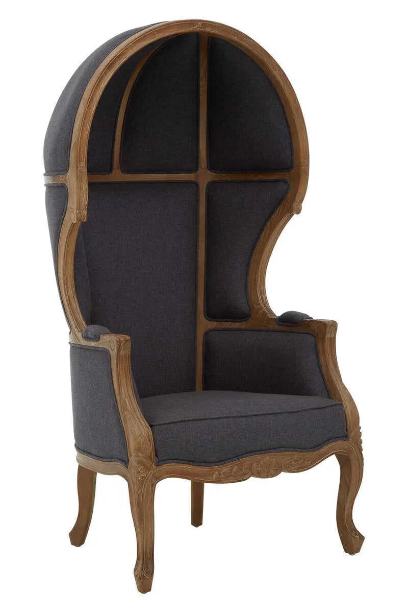 Dome canopy armchair with dark grey upholstery and carved wooden frame