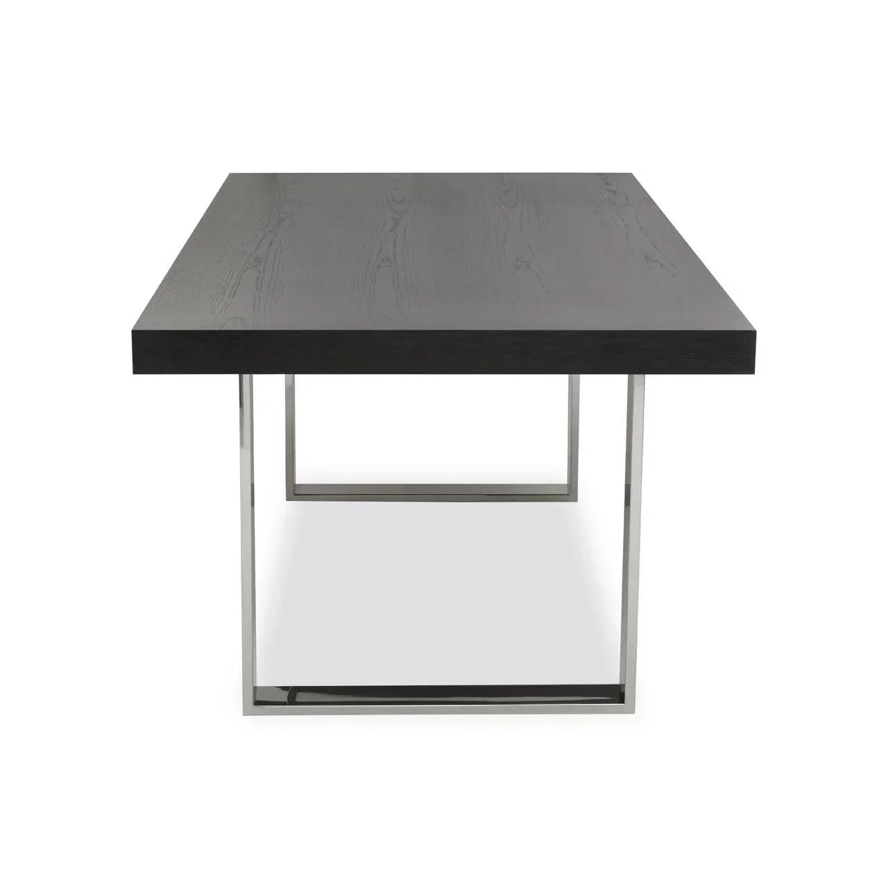 Rectangular black dining table with wood grain finish and chrome legs, front angle view