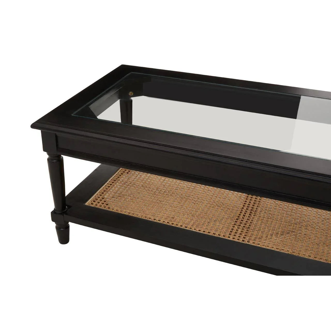 Black coffee table with glass top and lower rattan shelf, angled corner view