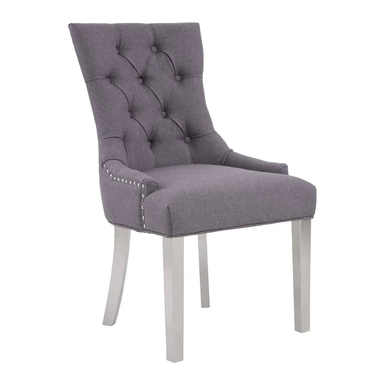 Grey upholstered dining chair with button-tufted back and silver stud detailing