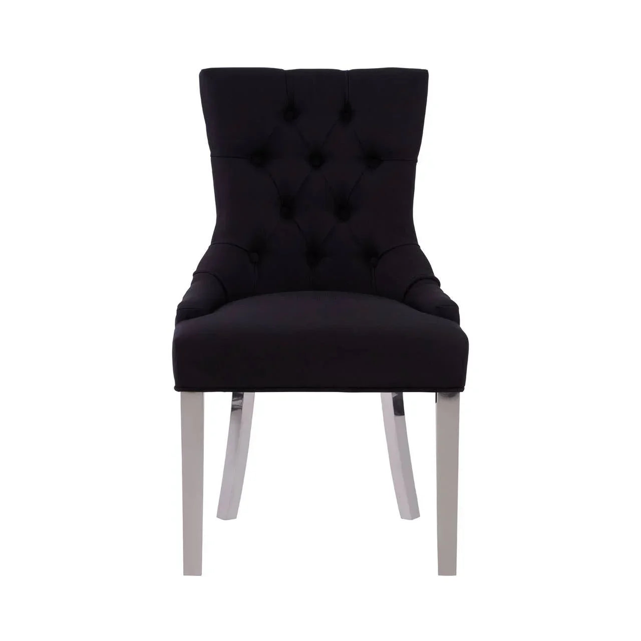 Black velvet dining chair with button-tufted backrest and chrome legs, front view