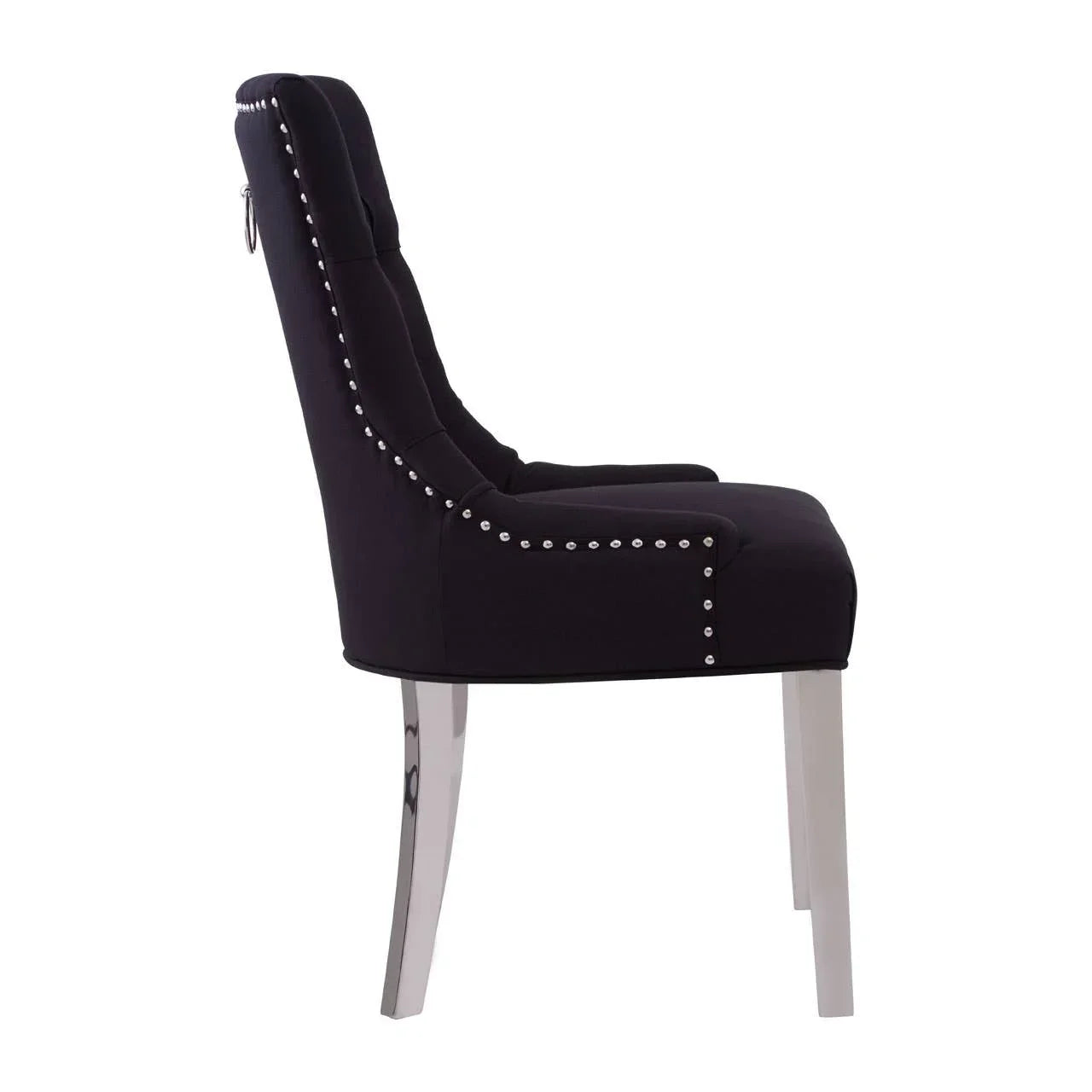 Black velvet dining chair with chrome legs and silver stud detailing, side profile view