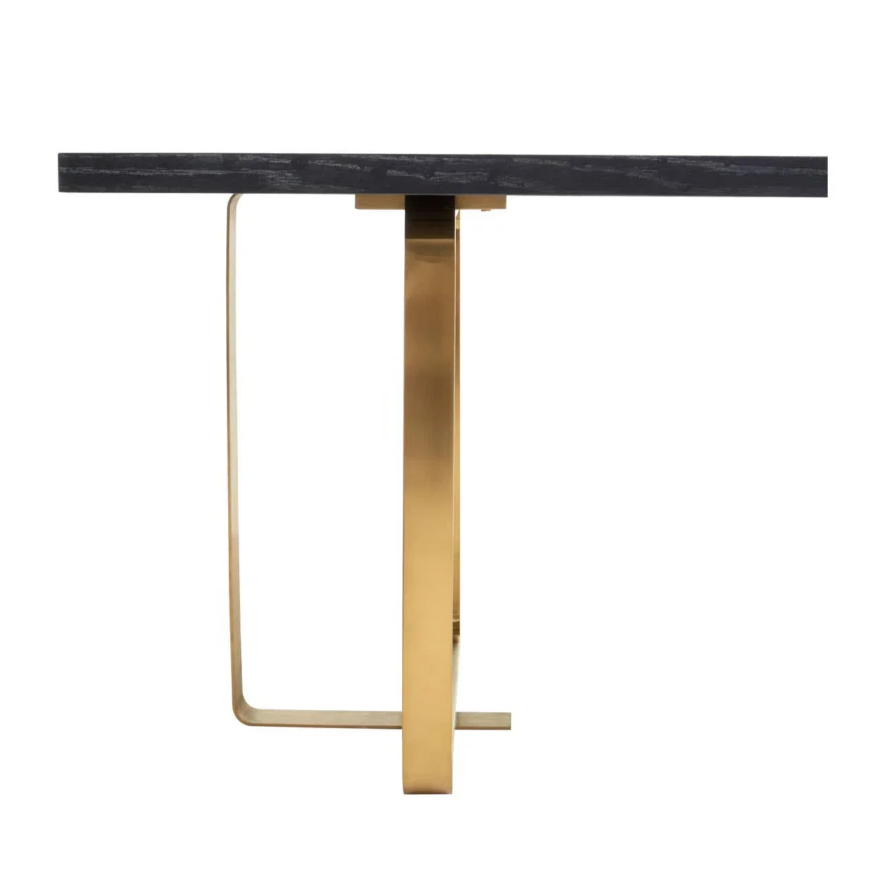 Modern dining table with black tabletop and gold metal base, side profile view